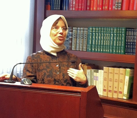 Professor Julie Belz at the podium during her lecture