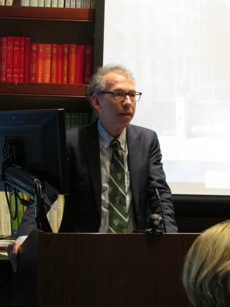 Dr. Michael Braun at the podium during his lecture