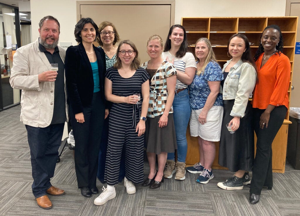 Dr. Shoshannah Lane (center) after her successful dissertation defense