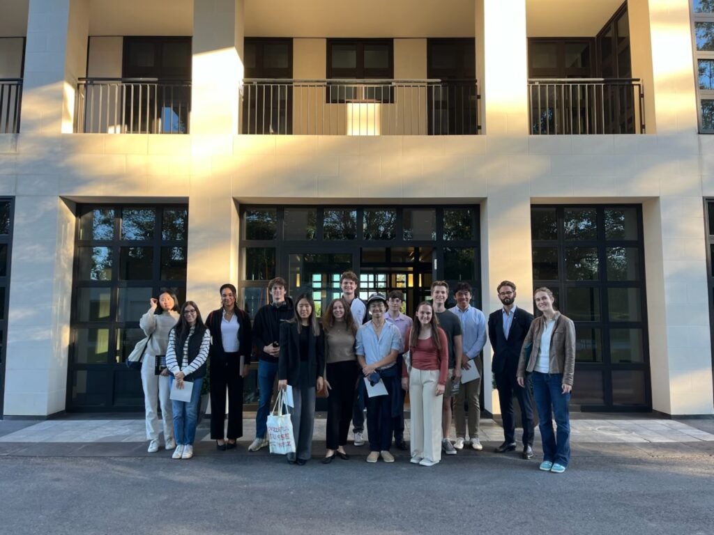 The members of the German Club stand outside the German Ambassador's residence