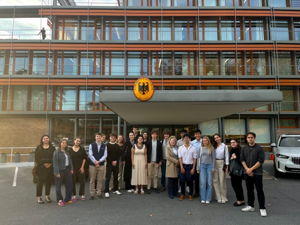 The members of the German Club stand outside the German Embassy