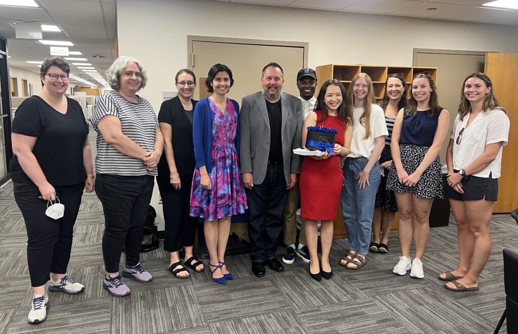 Members of the German Department pose with Katya Soloveva following her successful dissertation defense