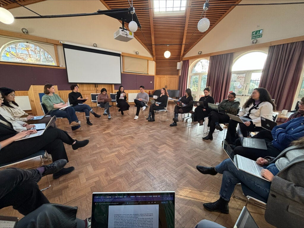 Students seated in a circle during the 2024 DAAD Doctoral Conference for German and European Studies