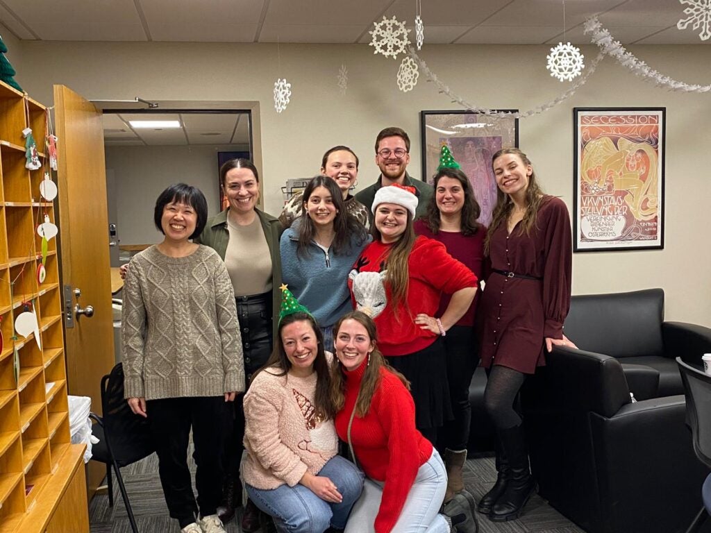 Visiting researcher Patrick Graur stands with German Department graduate students