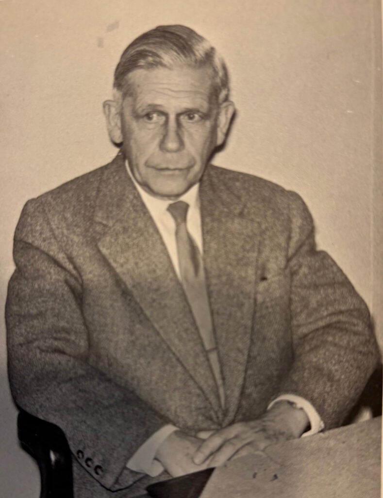 Assistant Professor of German Georg von Ihering sits at a desk