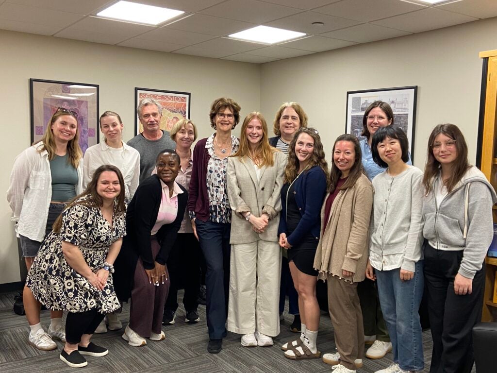 Lorna McCarron stands with members of the German Department following her dissertation defense on March 31, 2026.